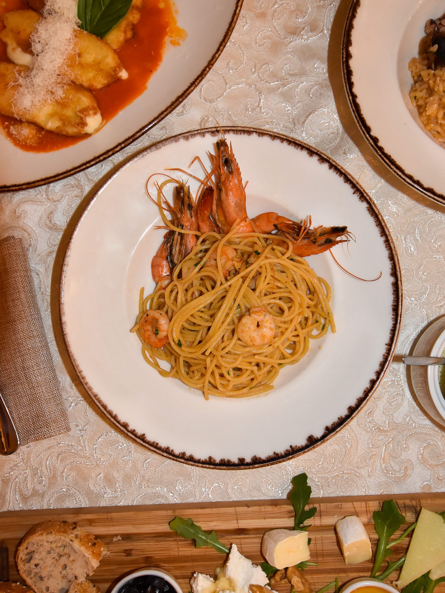 Delicious scampi shrimp pasta by Al Garage restaurant for food photography